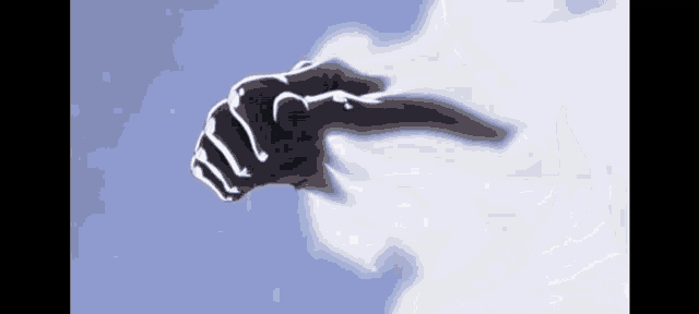 a person 's fist is flying through the air .