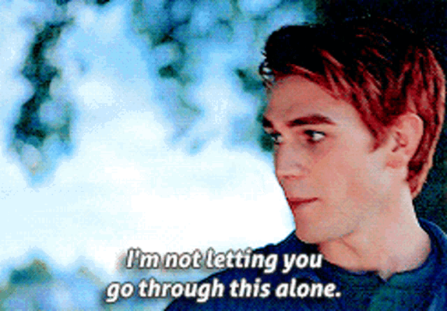 a man with red hair says i 'm not letting you go through this alone ..