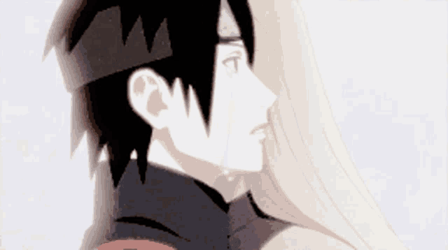 a man with a crown on his head is hugging a woman with long blonde hair