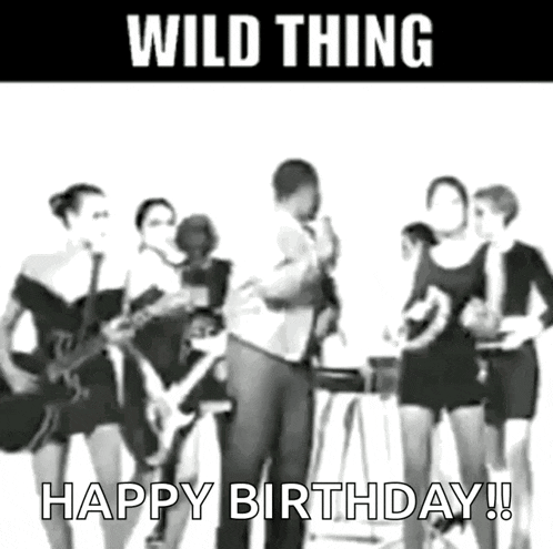 a black and white photo of a man standing in front of a group of women with the words wild thing happy birthday