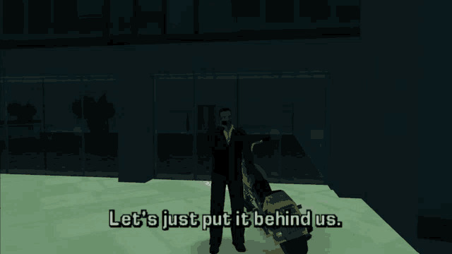 a man in a suit stands next to a motorcycle with the words let 's just put it behind us
