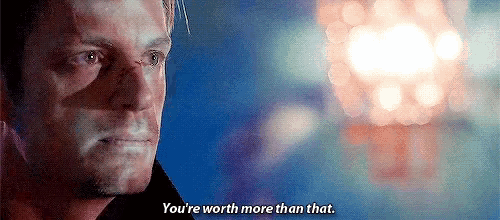a close up of a man 's face with the words `` you 're worth more than that '' written on the bottom .