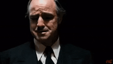 a man in a suit and tie is crying and says mira como masacraron a mi muchacho