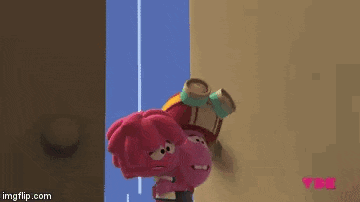 a cartoon character is standing next to a blue door .