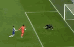 a group of soccer players are playing a game on a field