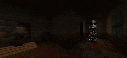 a dark room with a fireplace and a christmas tree in the corner