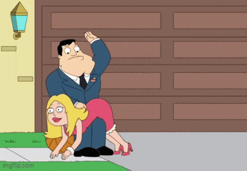 a man in a suit and tie is spanking a woman on the sidewalk