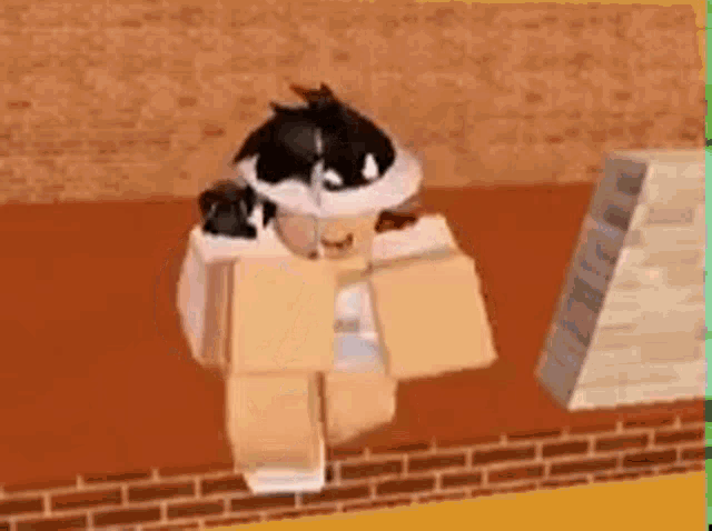 a cartoon character is standing next to a brick wall .