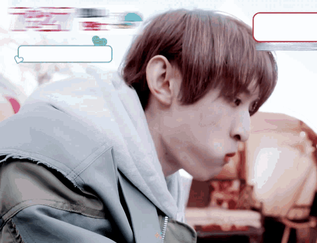 a young man with a speech bubble that says ' i love you ' on it
