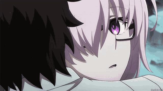 a close up of a person 's face with a purple eye