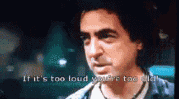a man in a blue shirt says if it 's too loud you 're too old