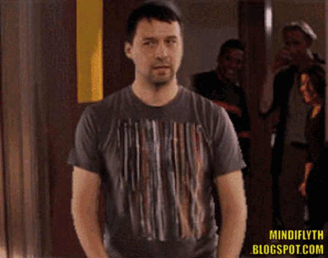 a woman wearing bunny ears and a corset is standing in front of a watermark that says mindifyth blogspot.com