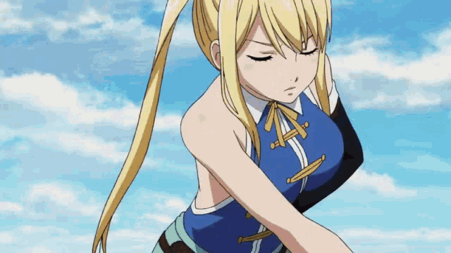 a blonde anime girl is holding a bat in her hands .