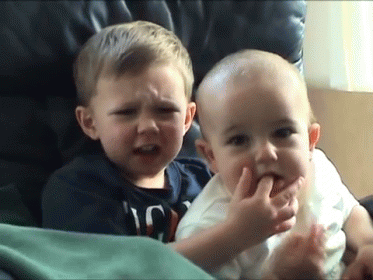 Ouch Charlie GIF - Siblings Baby Kid GIFs