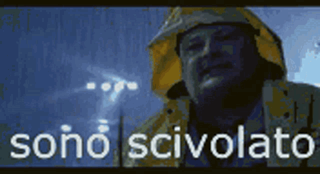 a man wearing a hard hat and a yellow raincoat says sono scivolato