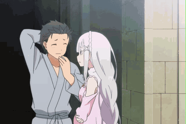 a man and a woman standing next to each other