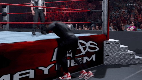 a wrestling ring with the word mayhem on the side