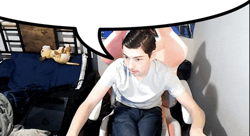 a man is sitting in a chair with a speech bubble above his head