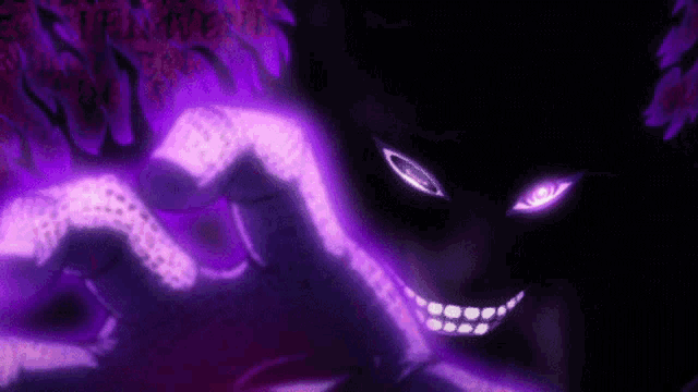 a close up of a person 's face with purple eyes .
