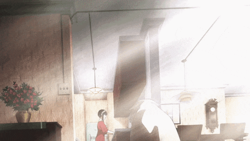 a woman in a red dress is standing in front of a piano