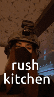 a woman wearing a helmet and a mask with the words rush kitchen on the bottom