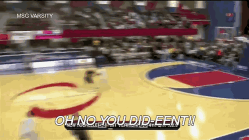 a msg varsity basketball game is being played in a stadium
