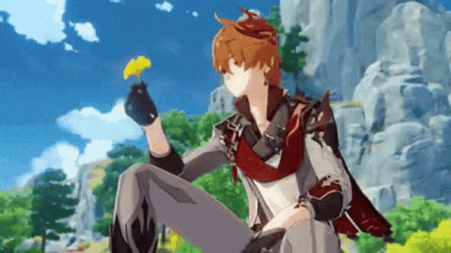 a cartoon character is holding a flower in his hand while sitting on the ground .