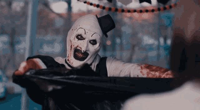 a clown with a top hat is standing in a trashcan