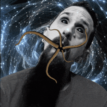 a man with a beard has a drawing of a starfish in his mouth