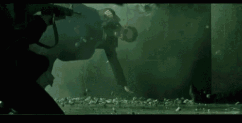 The Matrix Gun Fight GIF - The Matrix Gun Fight GIFs