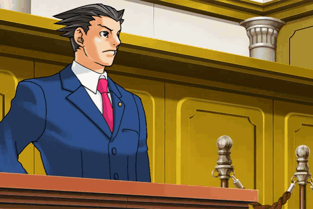 a man in a suit and tie is standing at a podium