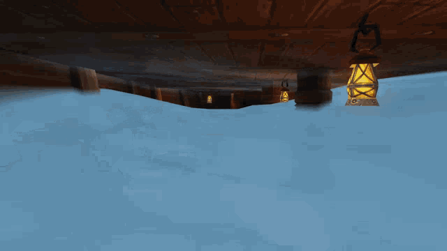 a lantern hanging from the ceiling of a wooden building