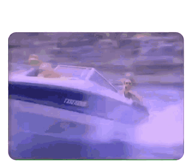 a boat with a license plate that starts with the letter t on it