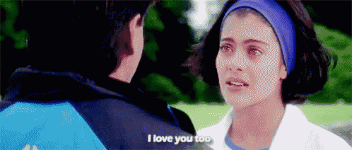 a man and a woman are looking at each other and the woman is crying while the man says i love you too .