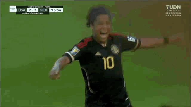 a soccer game between the usa and mexico is being shown on a television screen