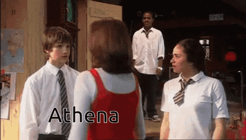 a group of people standing next to each other and the word athena is on the bottom