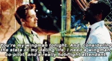 a man talking to another man with the words " you 're my wingman tonight " on the bottom