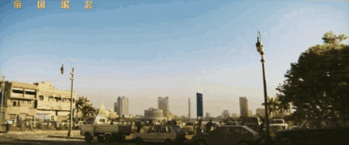 a blurry picture of a city with chinese characters on the bottom