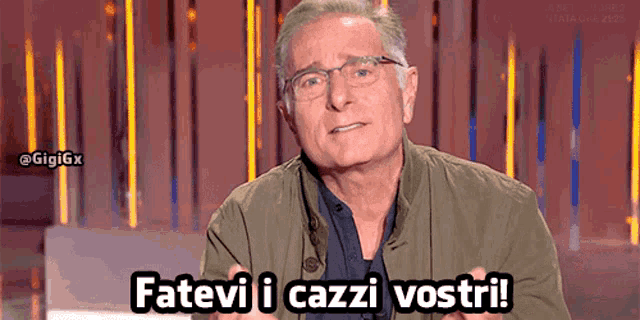 a man wearing glasses says " fatevi i cazzi vostri "