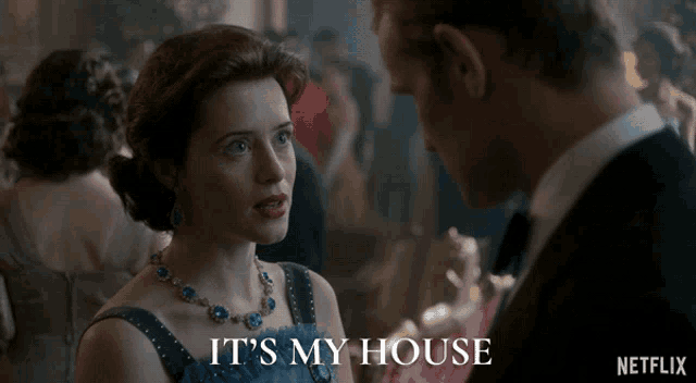 a man and a woman are looking at each other with the words it 's my house written above them