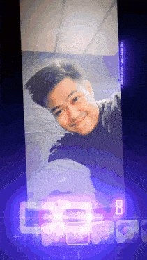 a man taking a selfie in front of a screen that says ' casio ' on it