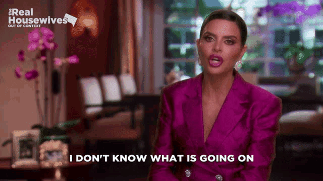 a woman in a pink suit says i don t know what is going on