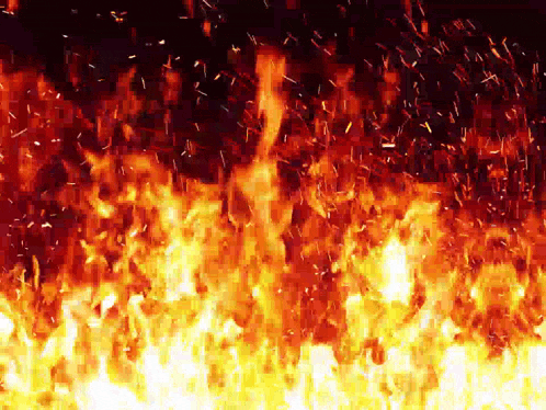 a fire with sparks coming out of it