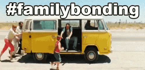 a group of people pushing a yellow van down a road with the words family bonding above it