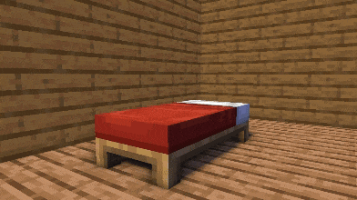 a bed with a red blanket is in a room with a wooden wall