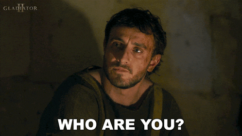 a man with a beard asks who are you