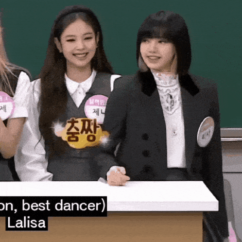 two girls are standing next to each other and one of them has a name tag that says lalisa