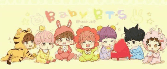 a group of baby bts are sitting next to each other in a row .