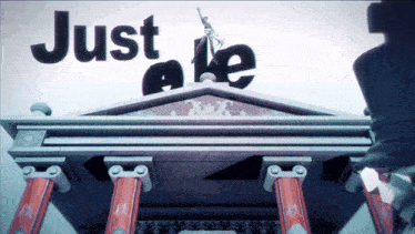 a statue of liberty stands on top of a building that says just a few
