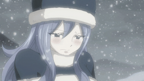 a girl with purple hair wearing a hat and scarf is standing in the snow